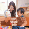 A specialist Pediatric doctor with a baby in clinic advertising NHRA Pediatrics MCQs